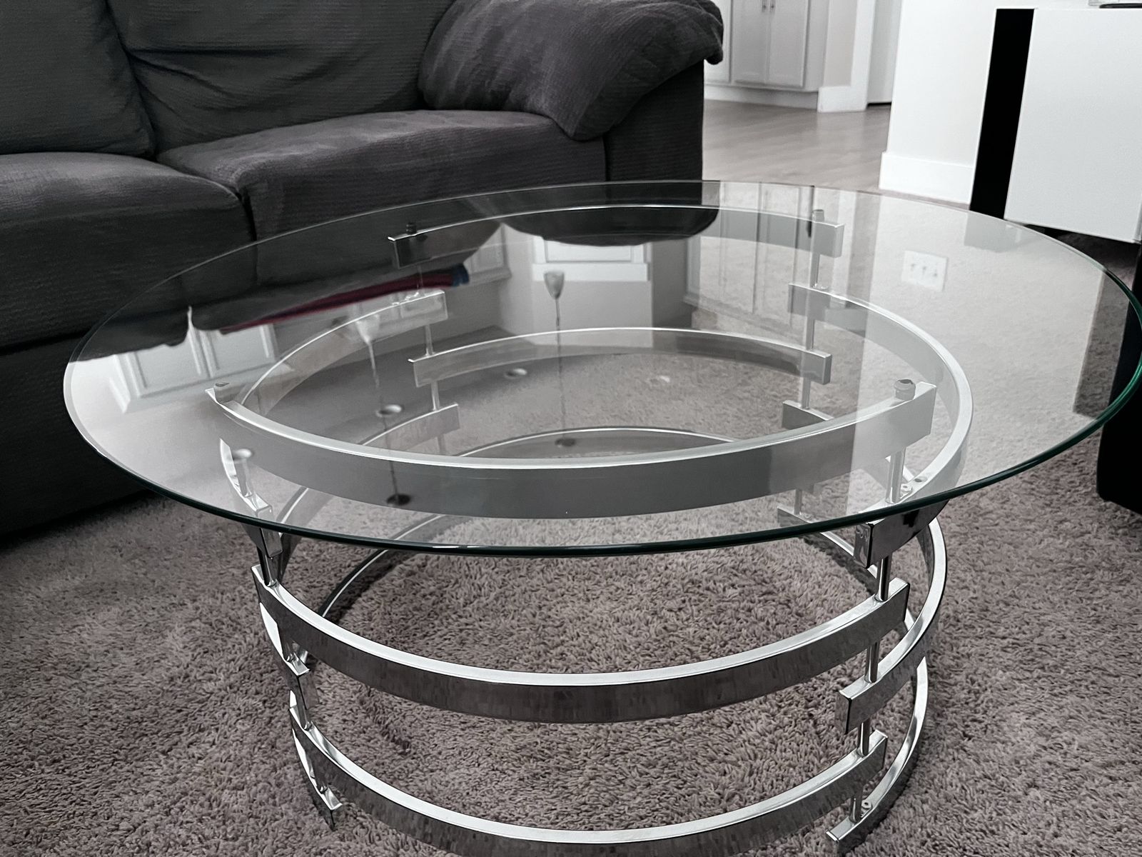 Glass coffee table with metal base