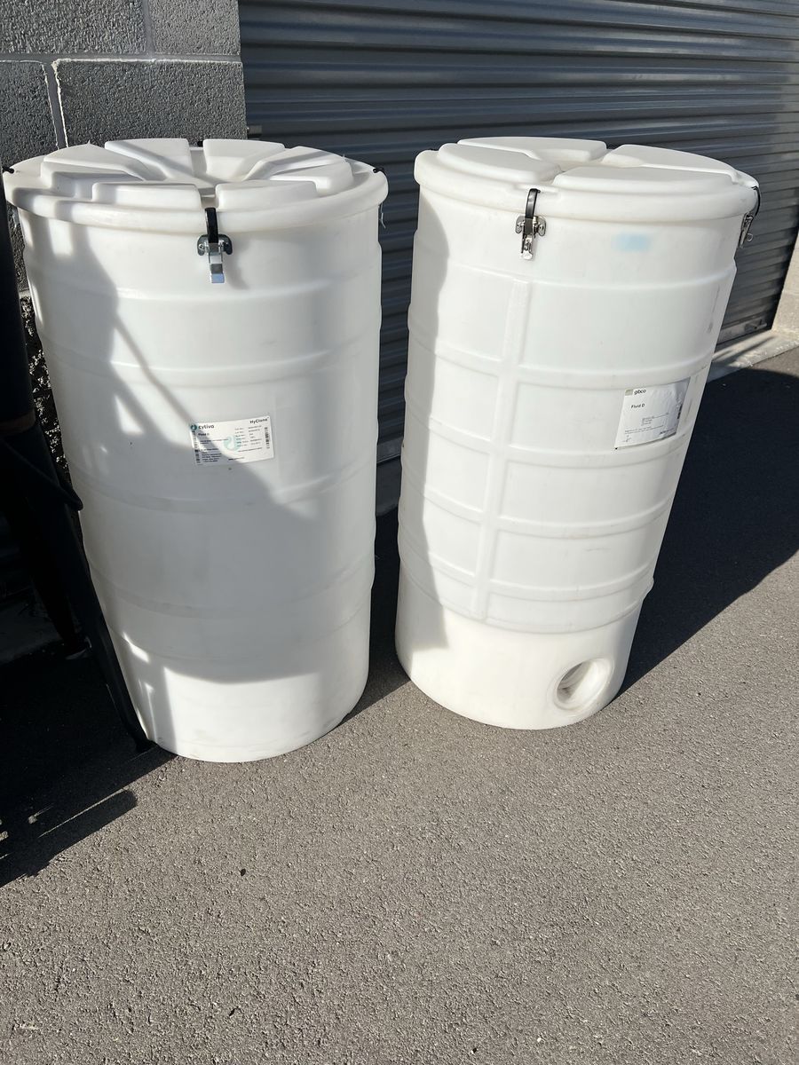2- 60 Gallon Poly Drum/Tank.