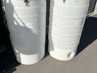 2- 60 Gallon Poly Drum/Tank.