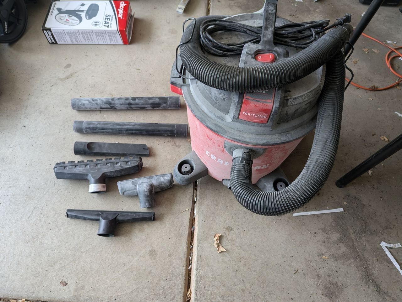 Craftsman 12 gallon wet/dry Shop Vac, lightly used, attachments included.