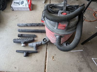 Craftsman 12 gallon wet/dry Shop Vac, lightly used, attachments included.