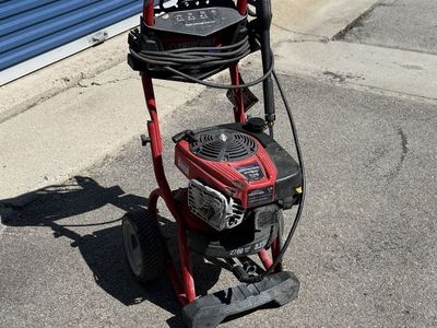 Running pressure washer. *DAMAGED