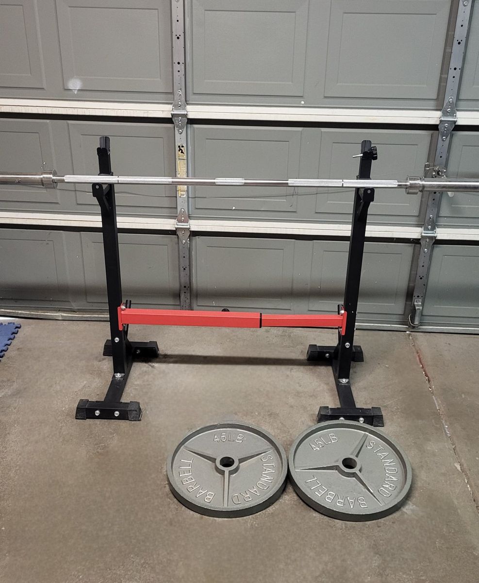 squat rack and 90 pounds of weights