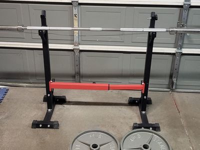 squat rack and 90 pounds of weights