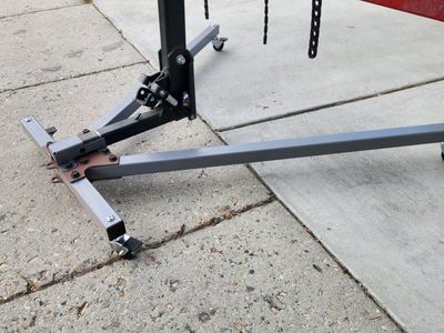Velocirax garage stand