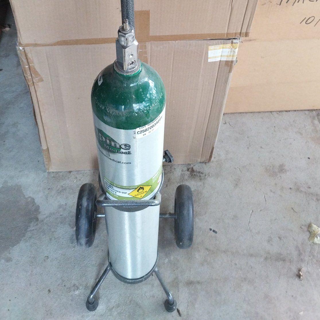 Oxygen tank half full with caddy