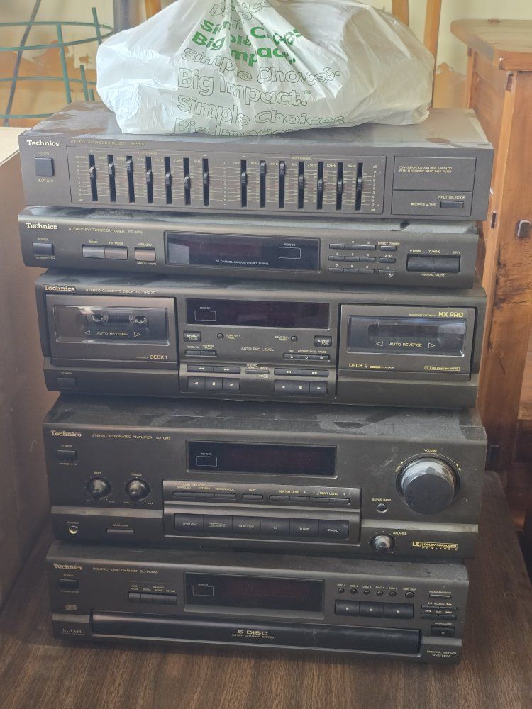 Stereo System and Speakers 5 Disc CD player, Dual Tape Decks, Synthesizer, Equalizer...  larger Speakers are about 3 feet tall