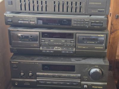 Stereo System and Speakers 5 Disc CD player, Dual Tape Decks, Synthesizer, Equalizer... larger Speakers are about 3 feet tall