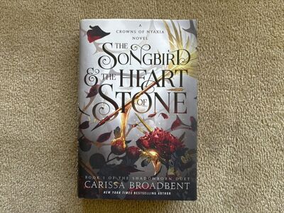 The Songbird & the Heart of Stone, by Carissa Broadbent (hardcover)