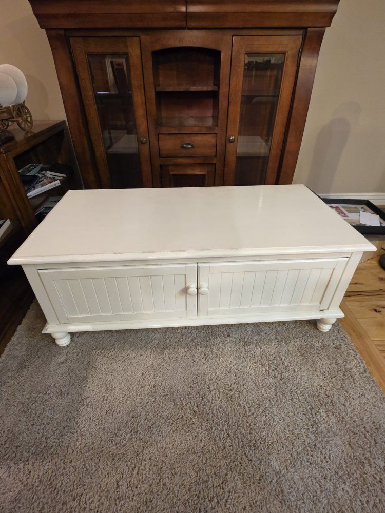 White Wooden Storage Coffee Table with Beadboard Front Doors