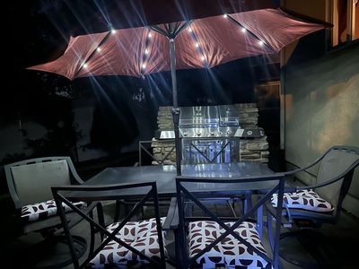 Patio Dining Set with Umbrella, Lighted, and 4 Chairs