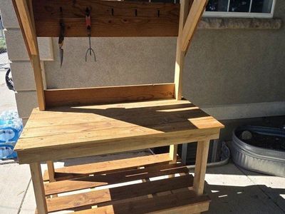 Cedar plant potting and repotting table