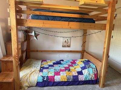 Wooden Loft Bed with Integrated Staircase Shelves and Built-in Desk
