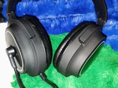USB Wired Headset with Microphone, Over-Ear Headphones, Black with multi-colored lights.