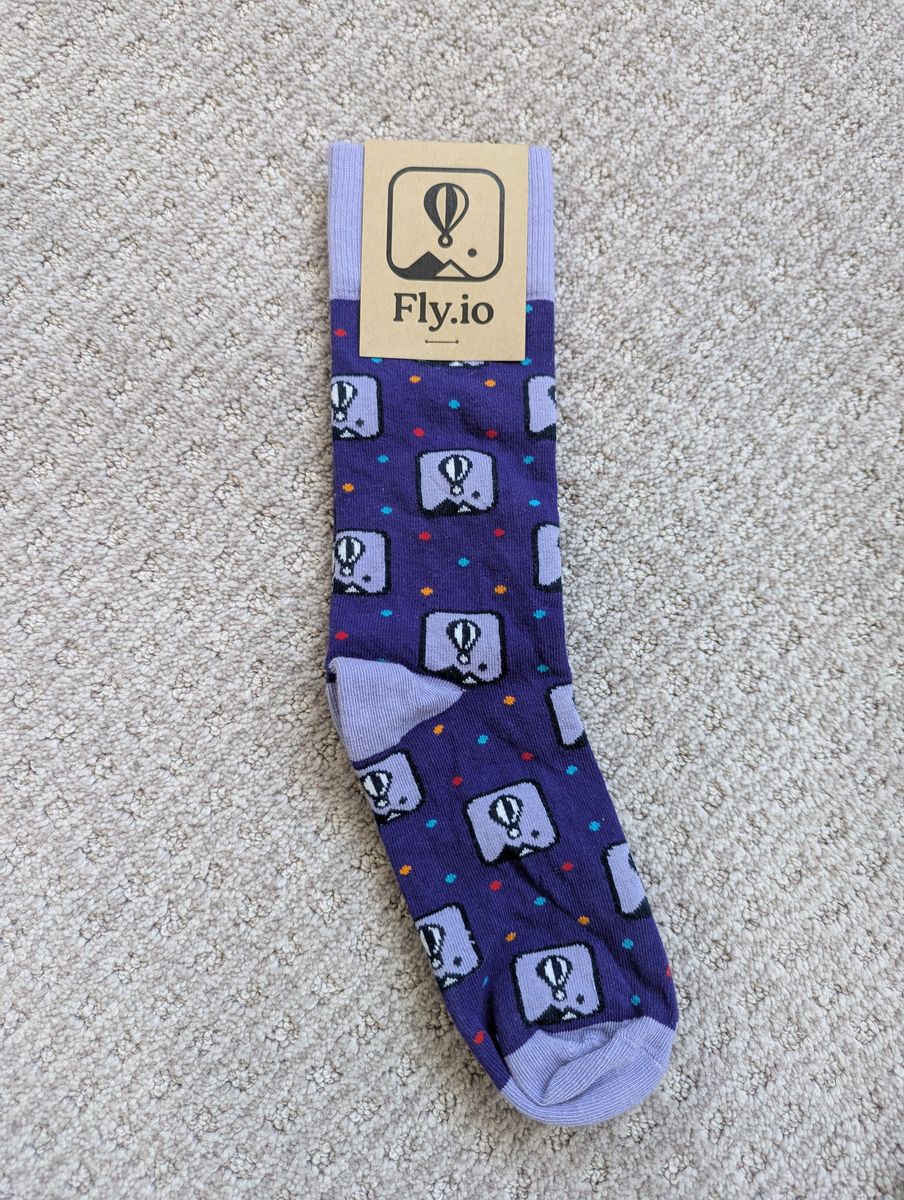 Fly.io branded Sock Club purple hot air balloon mens dress socks