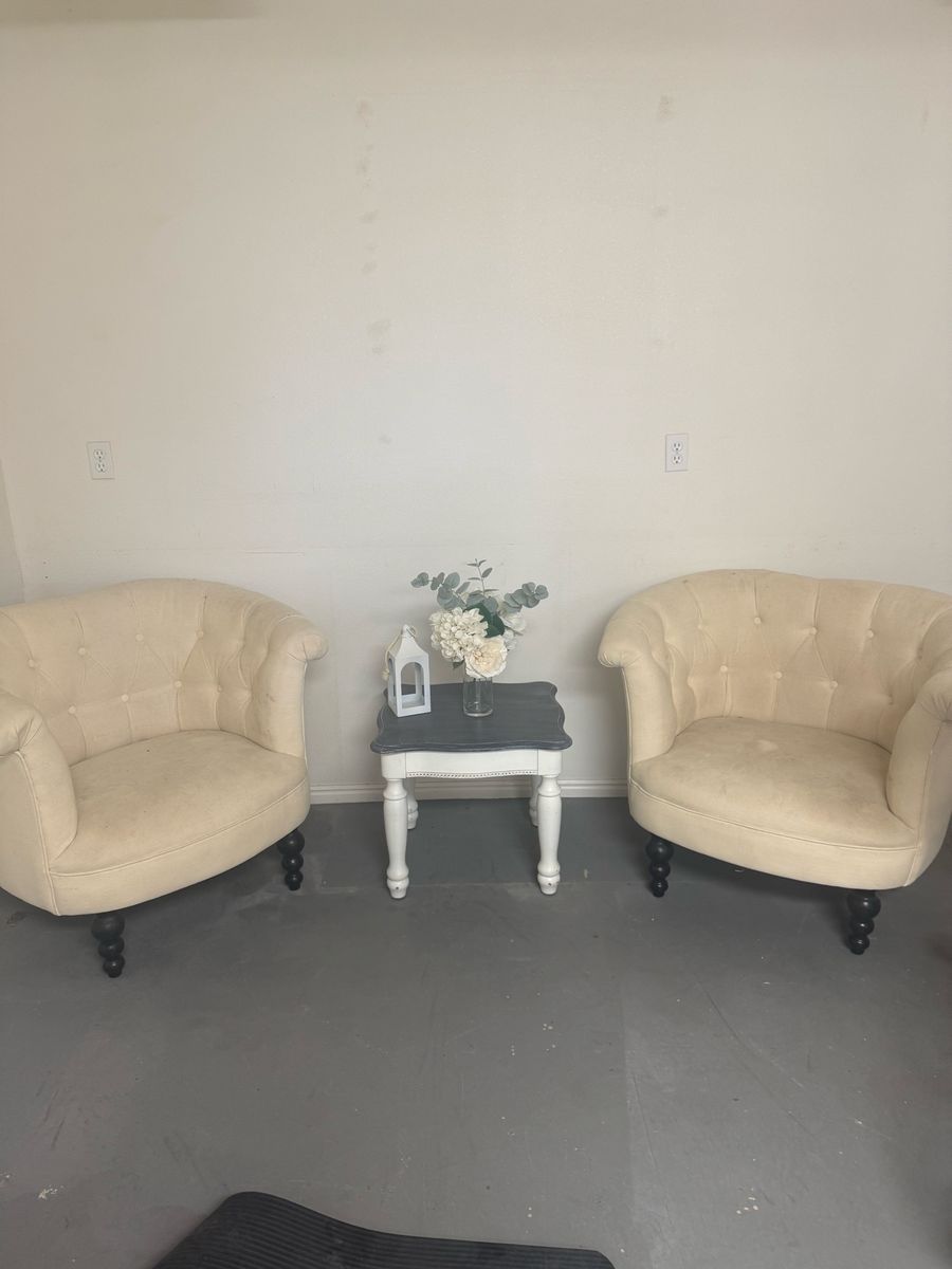 2 white chairs