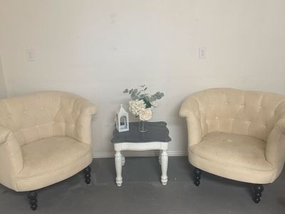 2 white chairs