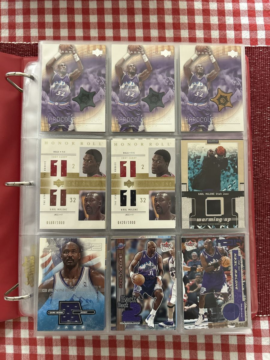 167 Different Karl Malone Basketball Relic Cards Lot - Upper Deck, Fleer Ultra, Topps Game Used Jerseys & Warm-Ups