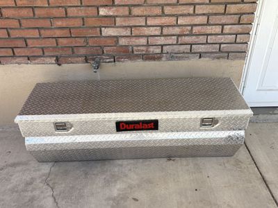 Truck Box 56” W, 19” H, 20” D.