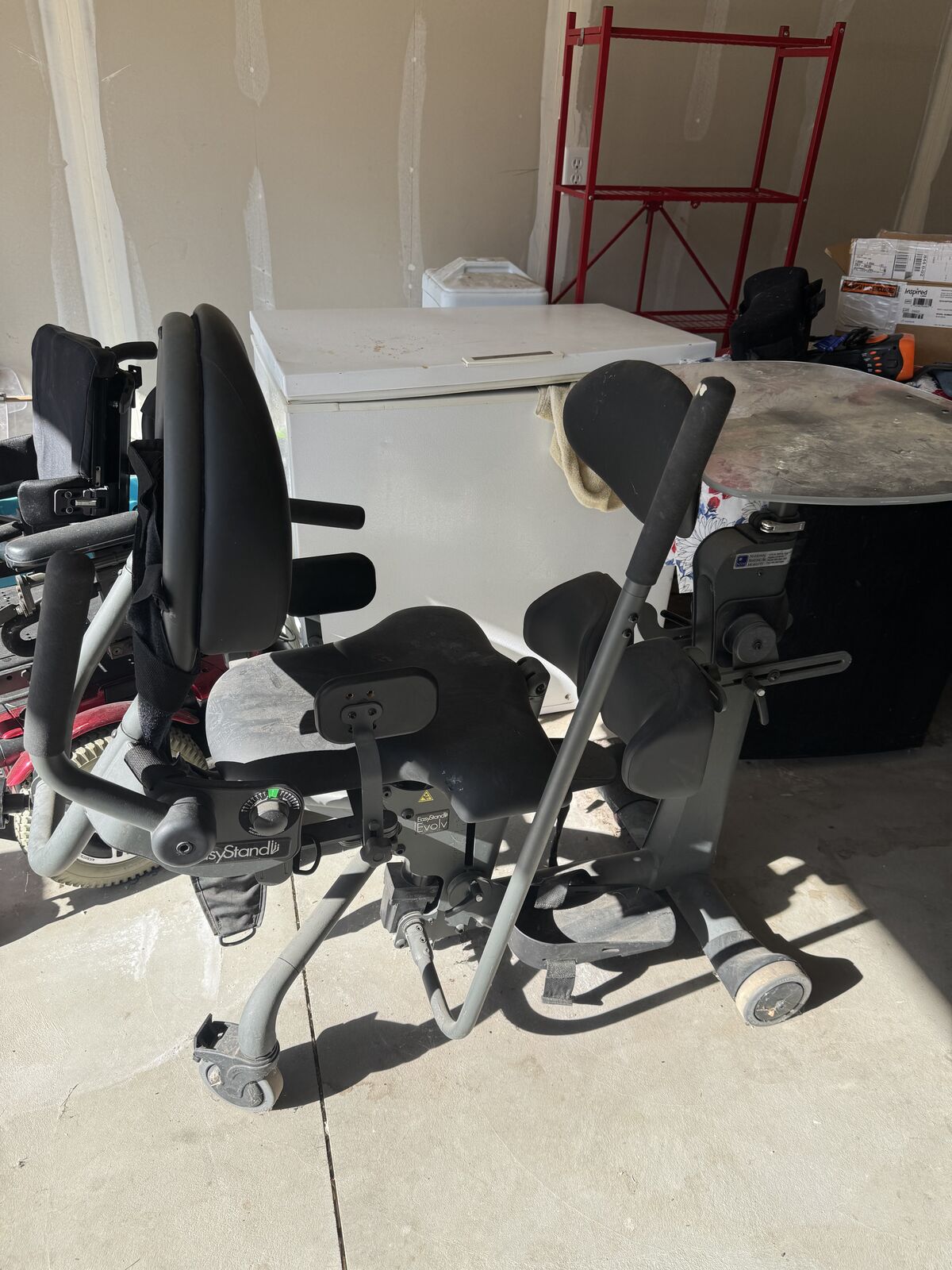 standing wheelchair / standing frame, specifically an EasyStand Evolv (by Altimate Medical)