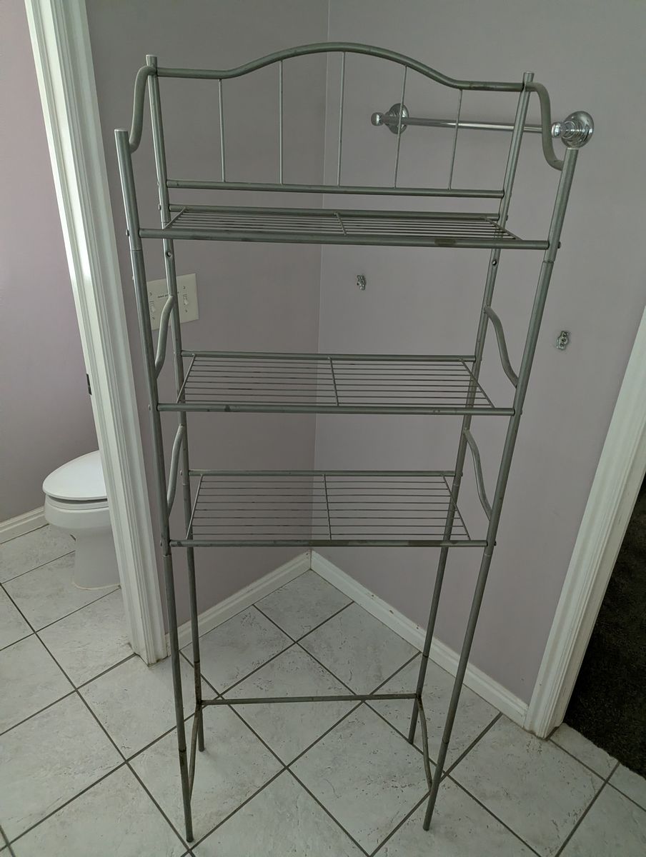 Storage shelf for above a toilet
