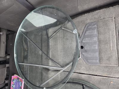 2 glass top tables