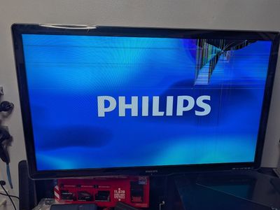 46" damaged screen TV with wall arm mount