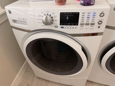 GE White Front-Load Washer & Electric Dryer Set with Steam & Vibration Control (Minor Washer Knob Issue)