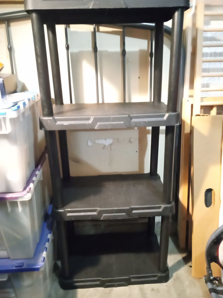 Black plastic 4 tiered shelf storage