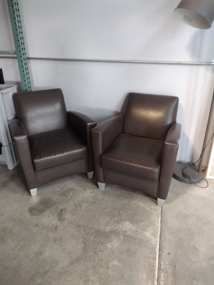 Brown padded chairs