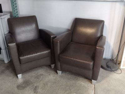 Brown padded chairs