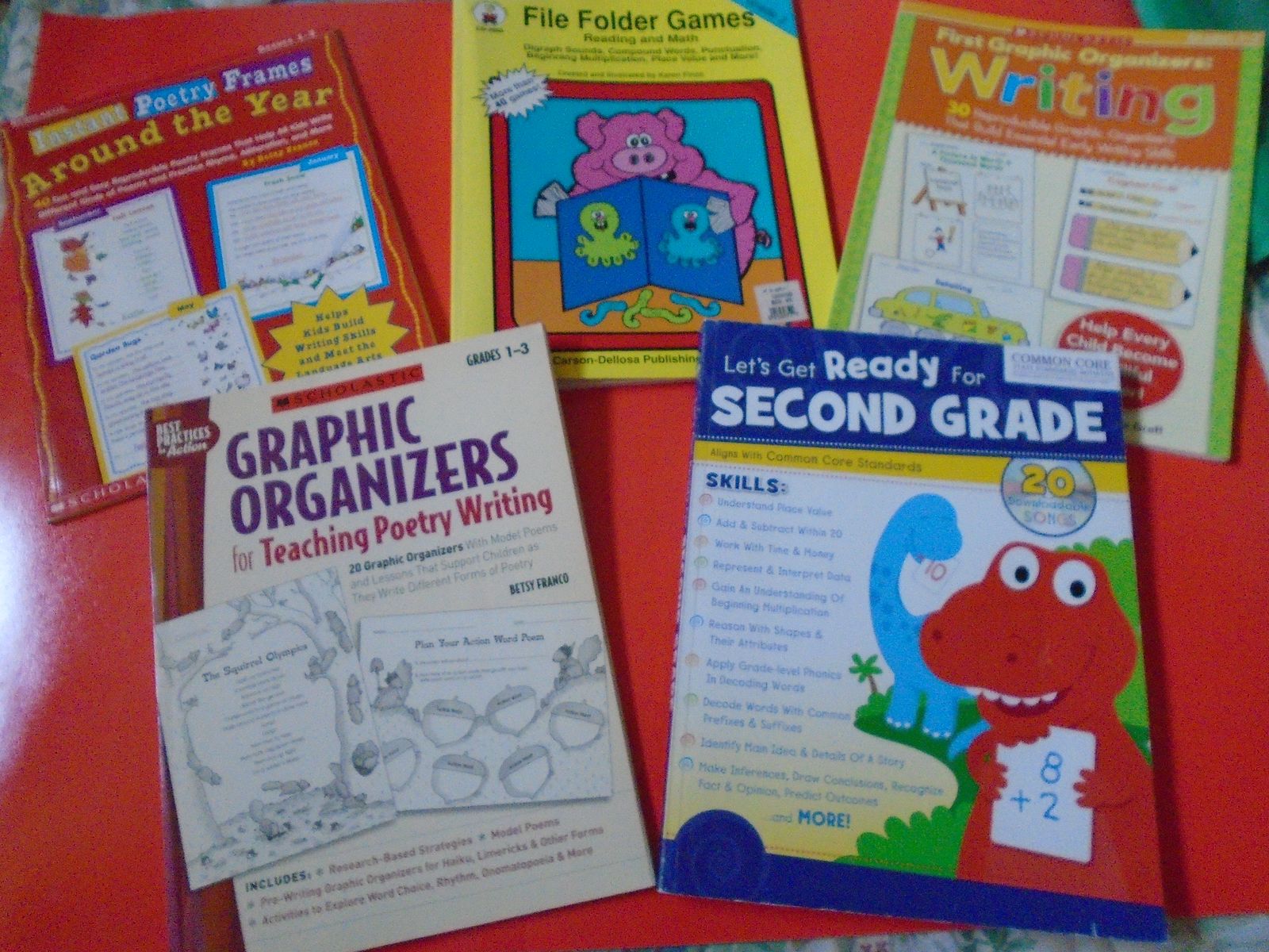 Assortment of learning workbooks