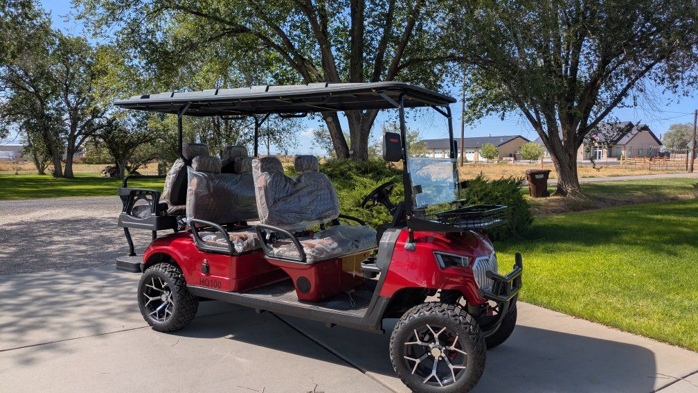 HQ100 Red Multi-Seater Golf Cart with Extended Roof and Custom Wheels