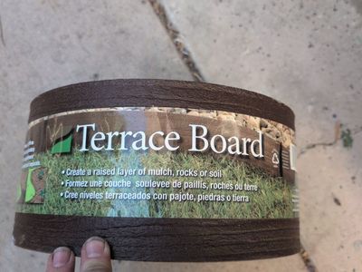 New Terrace board. 5" tall, 40 feet long with stakes