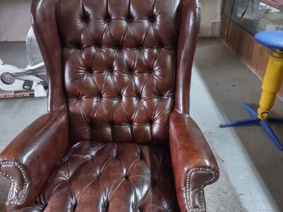 2 leather wing back chairs