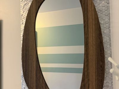 modern asymmetrical wood-effect mirror