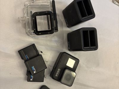GoPro HERO7 Black Action Camera Bundle with Batteries, Dual Chargers, Housing & Remote