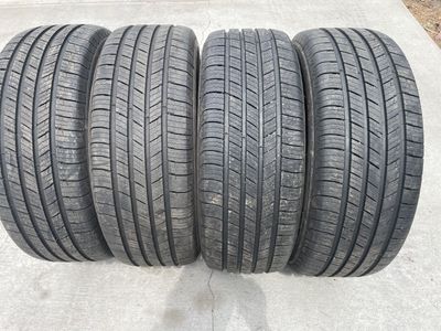 Michelin tires with more than 2/3 tread. 325X55X17 inch