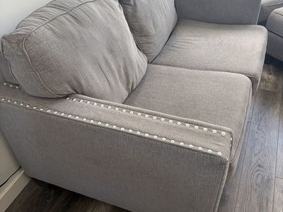 Gray Fabric Loveseat with Nailhead Trim