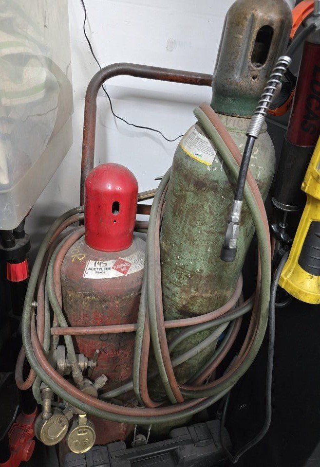 Oxy- Acetylene set w/dolly, hoses, regulator, tip.