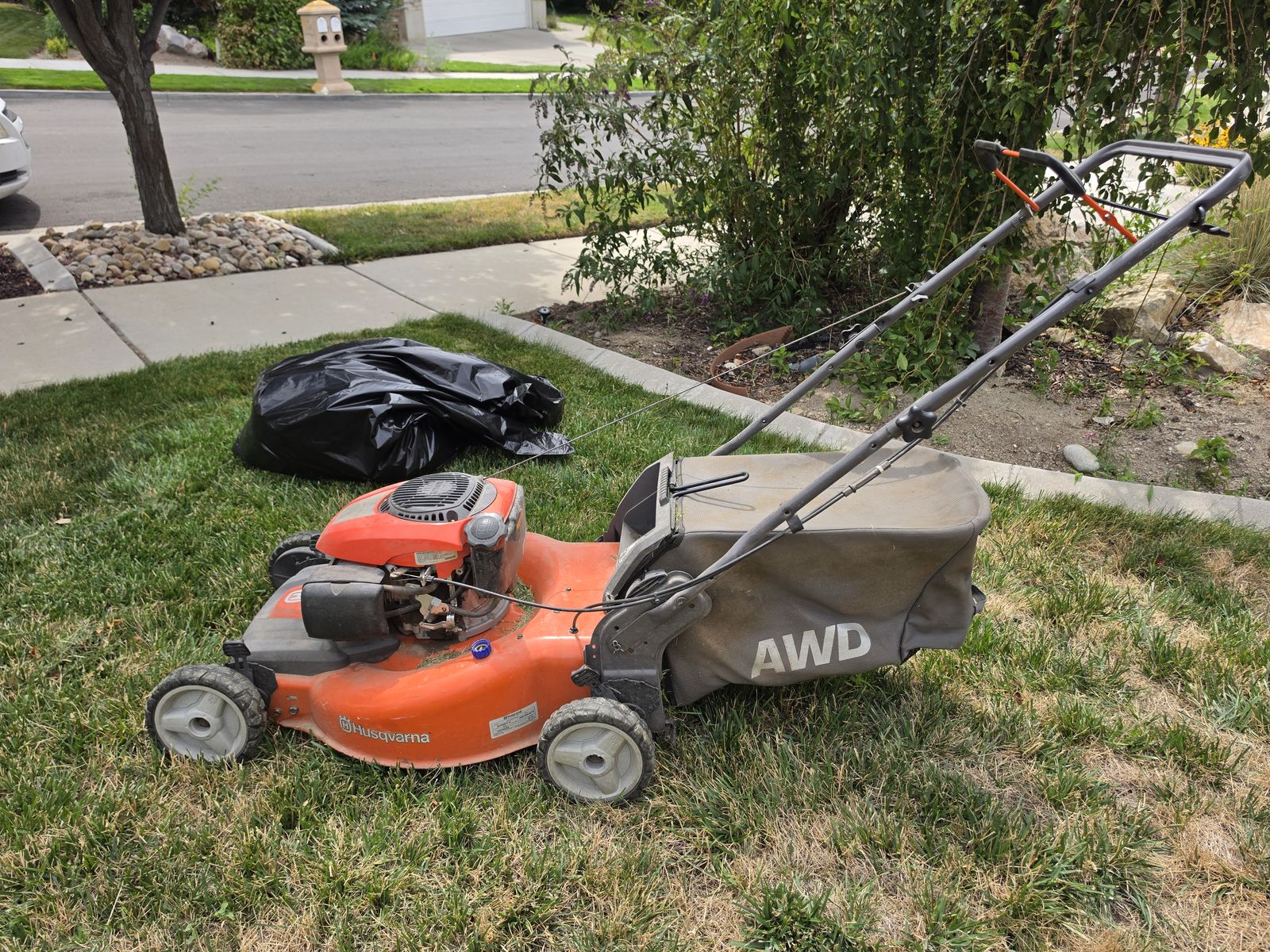 Husqvarna All-Wheel Drive (AWD) Gas Walk-Behind Lawn Mower with Grass Bagger