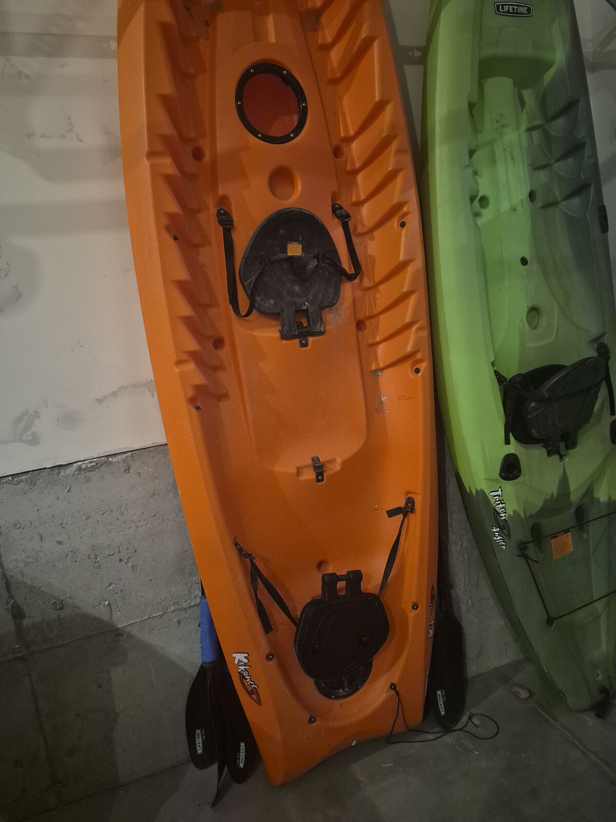 Two Lifetime kayaks