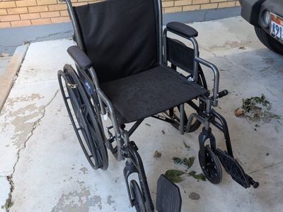 Medline Standard Wheelchair with Black Upholstery and Footrests $50 or OBO