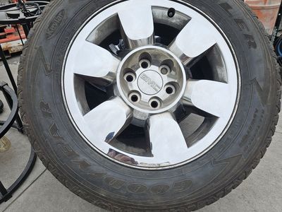 3/ 275 60 r 20 tires/rims stock chvy 1/2 ton