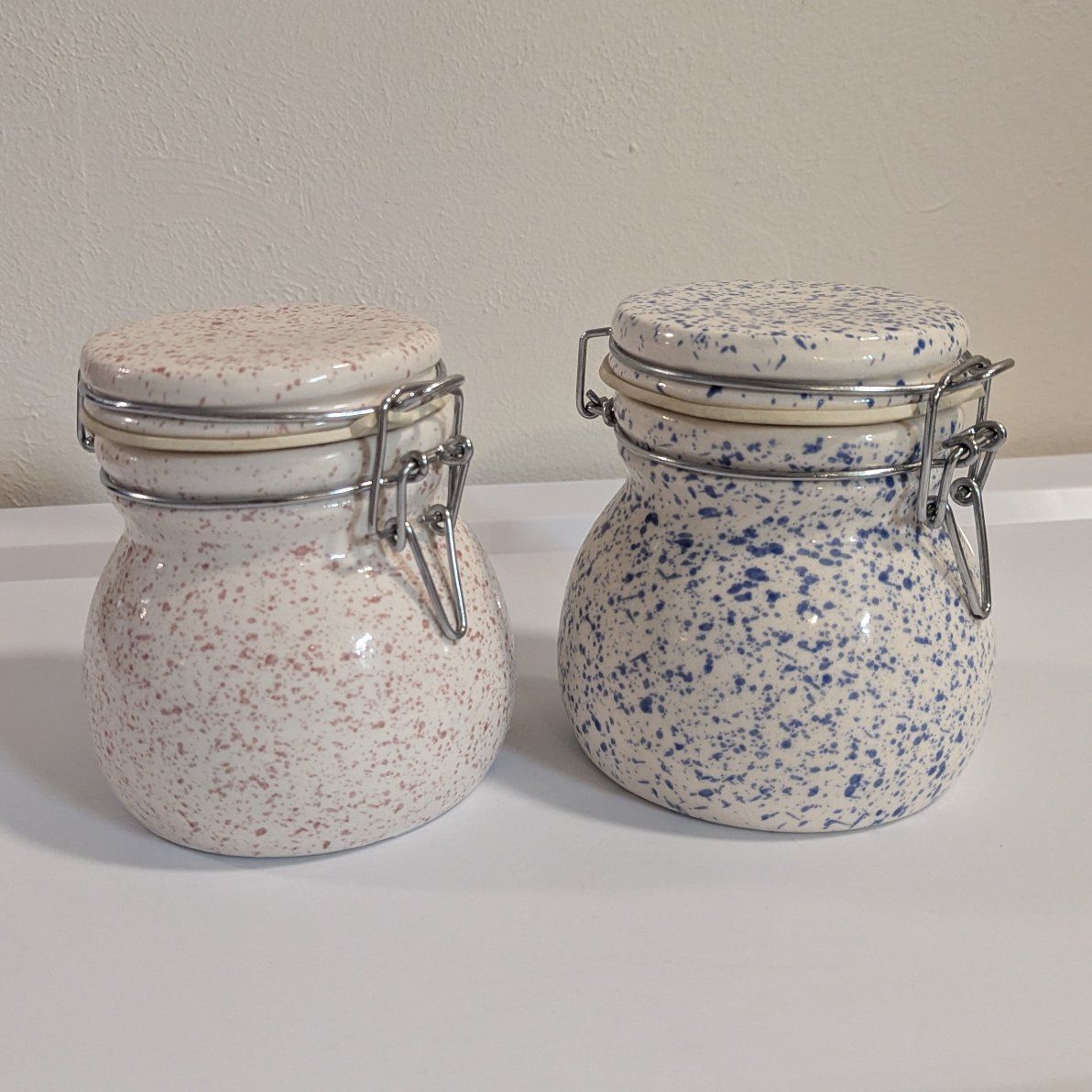 Pink and blue speckled ceramic canisters