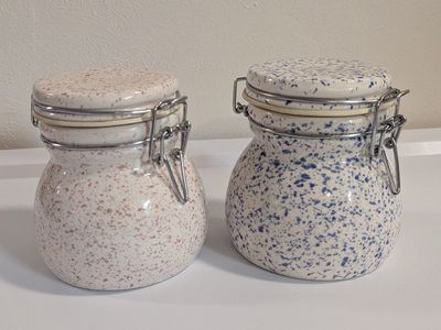 Pink and blue speckled ceramic canisters