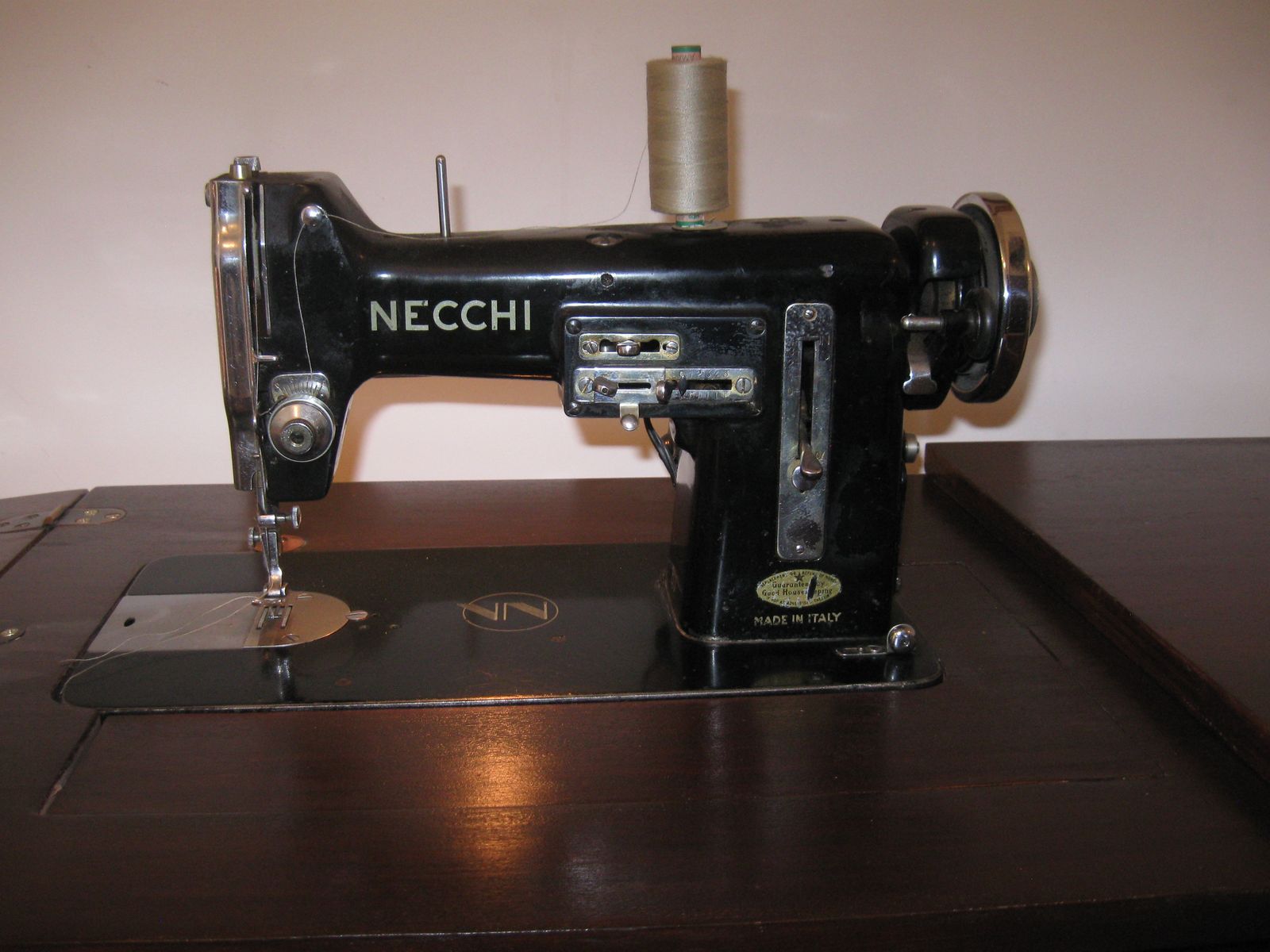 Necchi sewing machine in cabinet