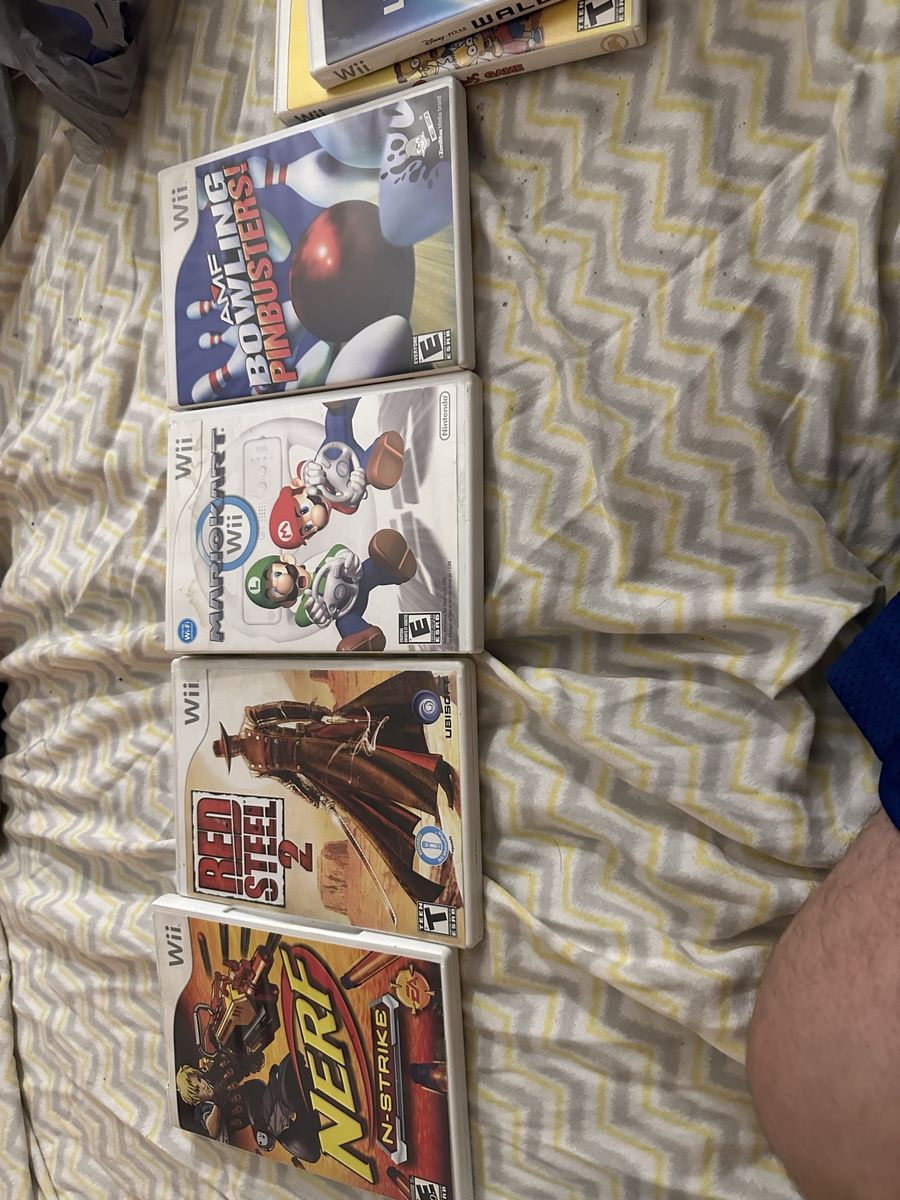 Nintendo Wii Bundle with Nerf Gun Controller and 9 Games