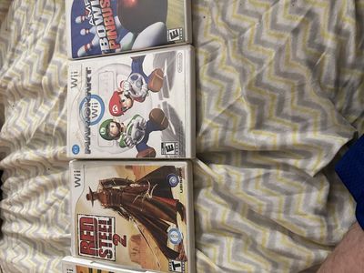 Nintendo Wii Bundle with Nerf Gun Controller and 9 Games