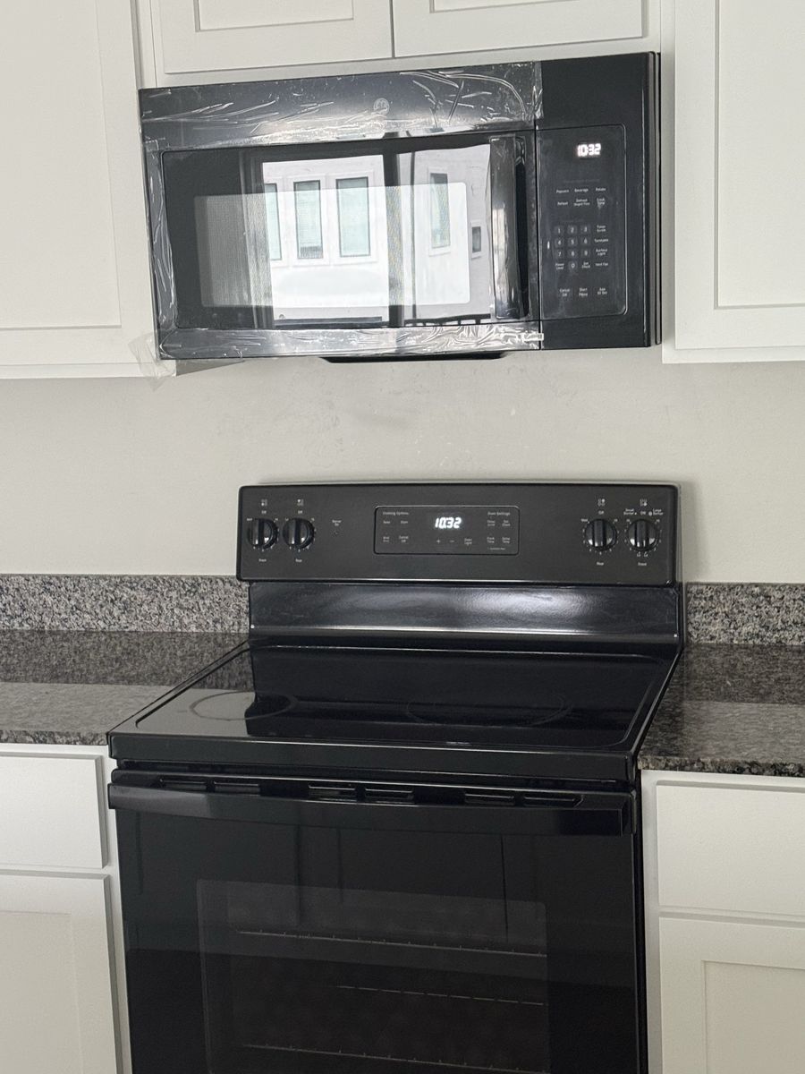 Black GE Microwave Door Only